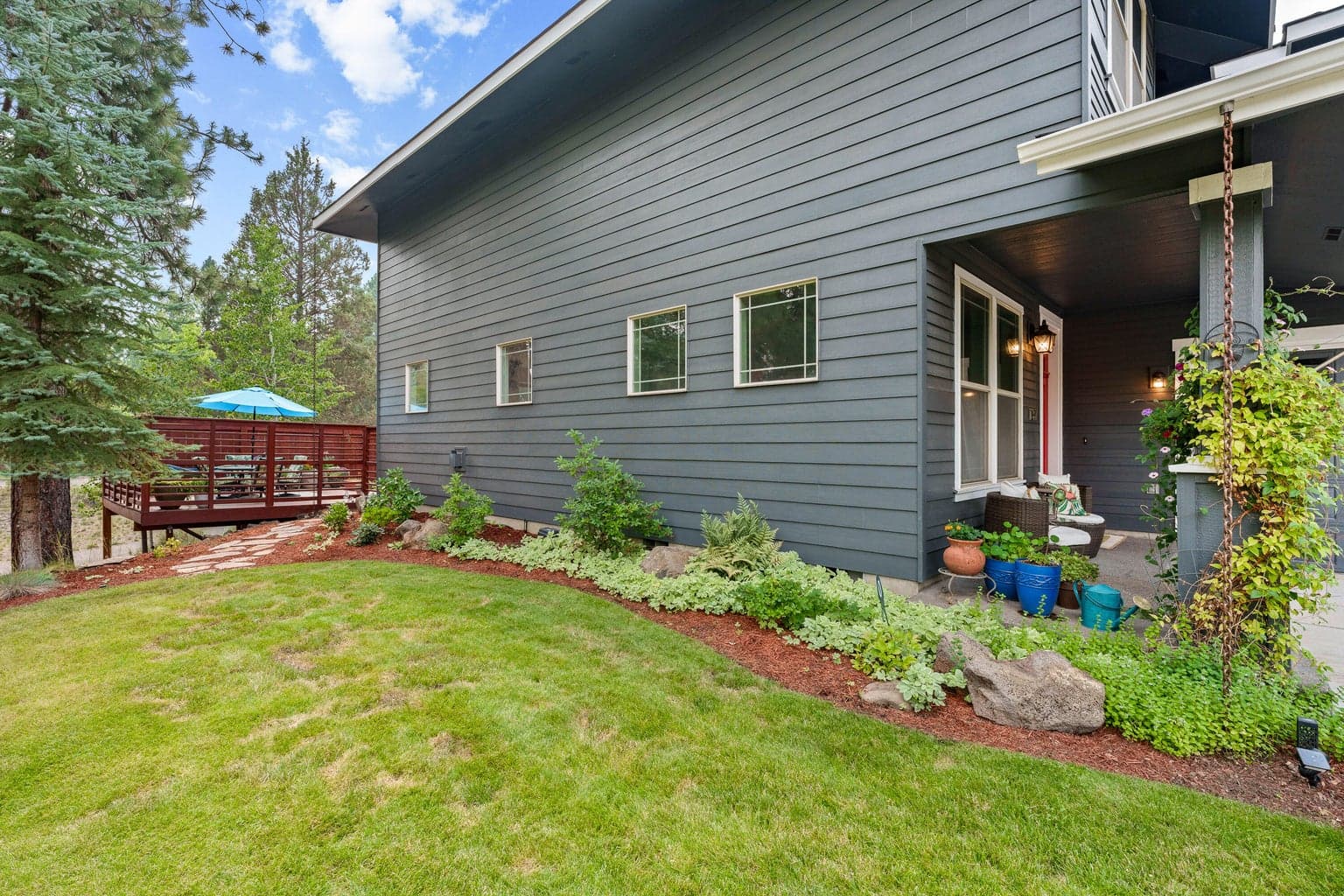 grassy area to right of house