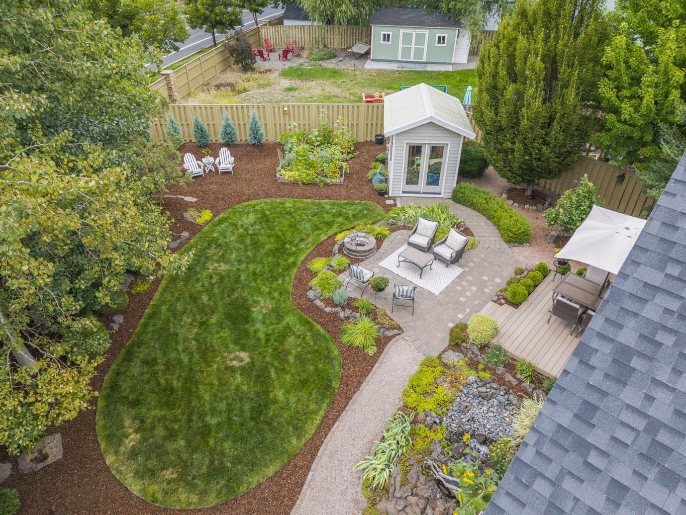 Looking down from above you can see the green house and raised garden beds.