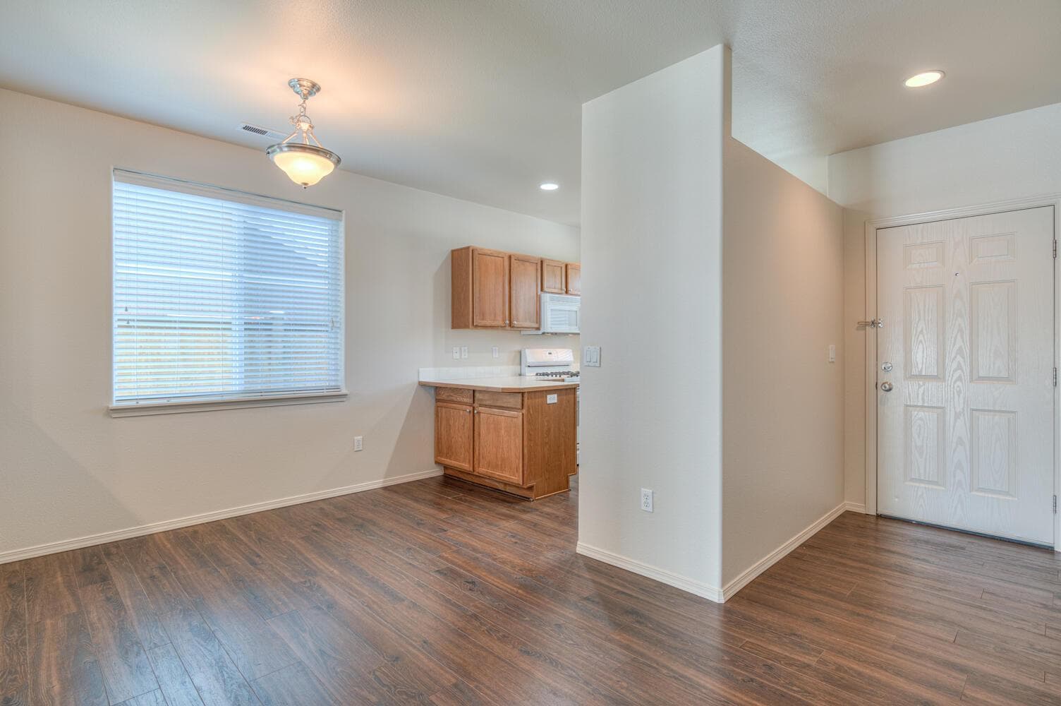 Front door and dining area