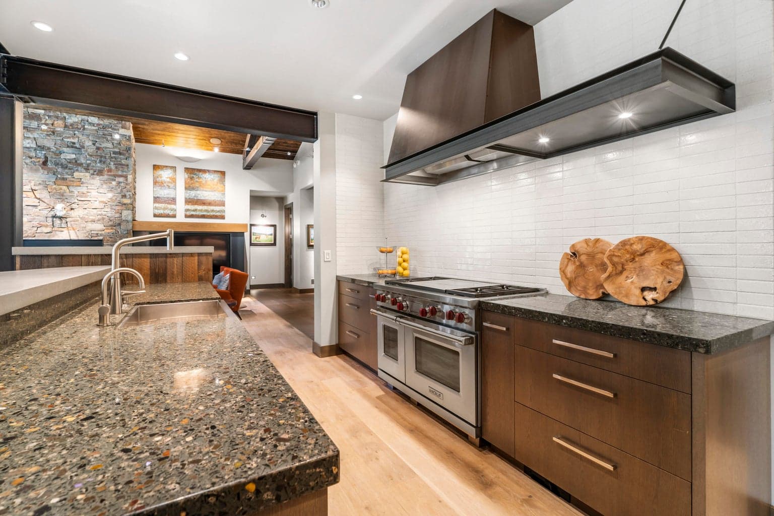 The gourmet kitchen is a chef’s dream featuring high-end appliances.