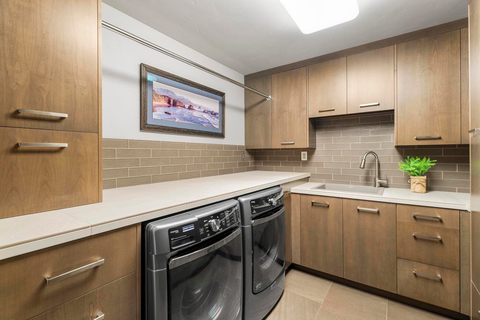 Thoughtful details continue w/ central vac, oversized heated 2-car garage w/ golf cart bay plus an additional heated 1-car garage.