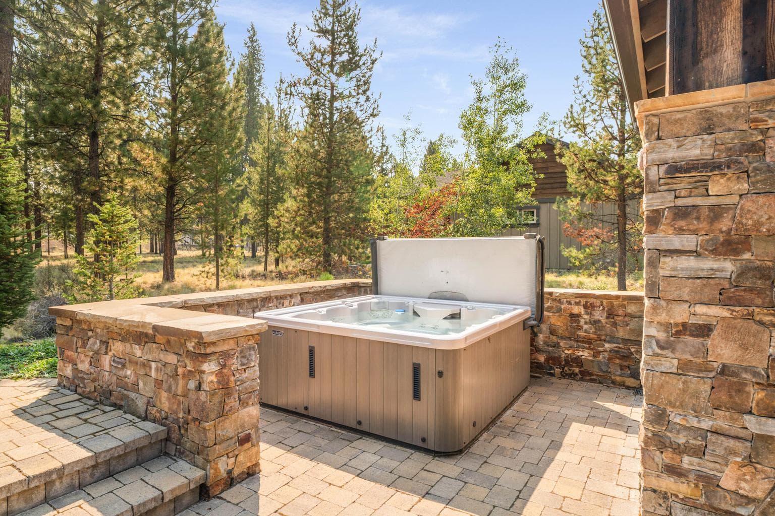 Radiant ice-melt has been added from the slider to the hot tub & along the pathway to the garbage area.
