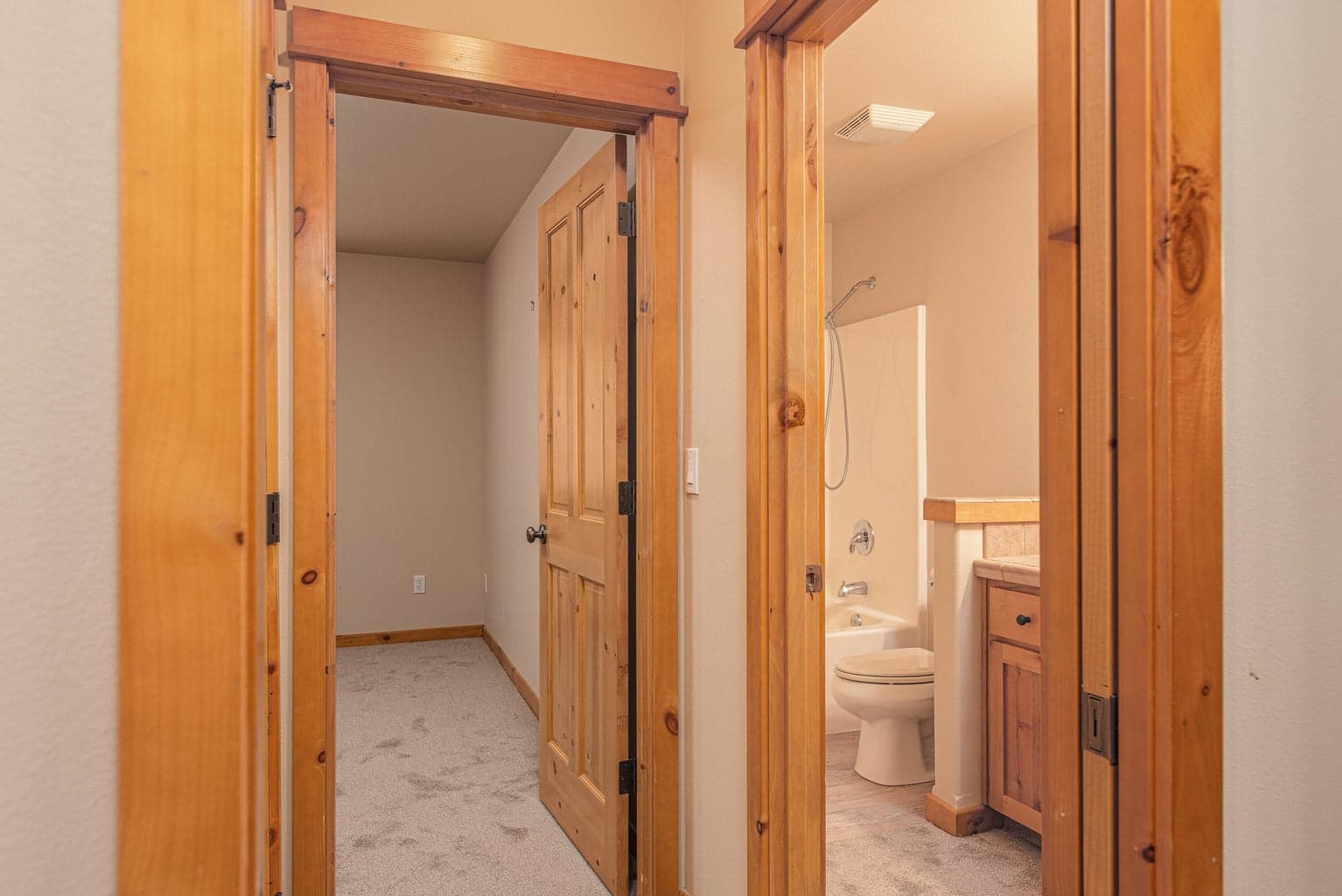 Hall bathroom located conveniently off of the secondary bedroom