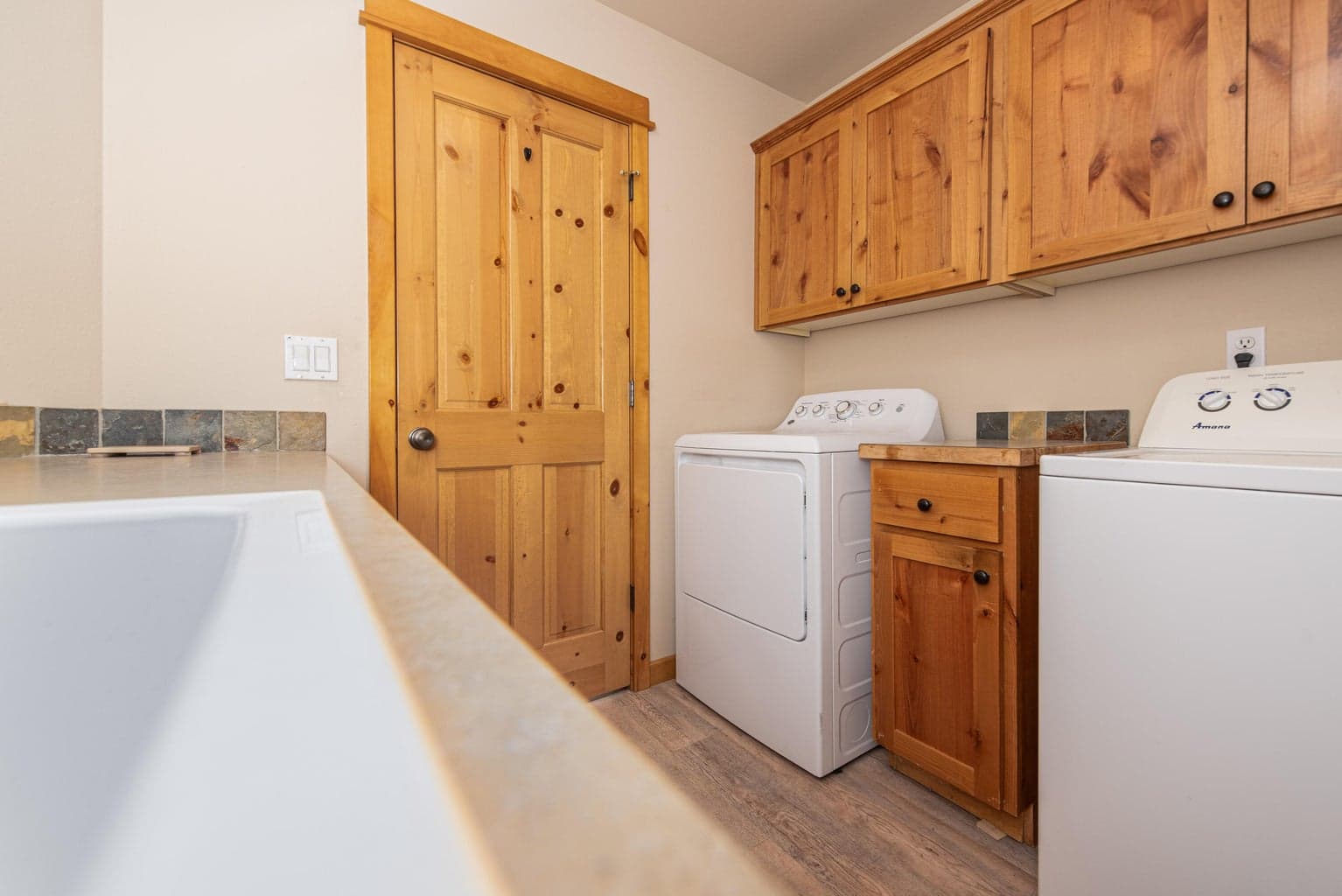 Laundry room immediately off of the garage