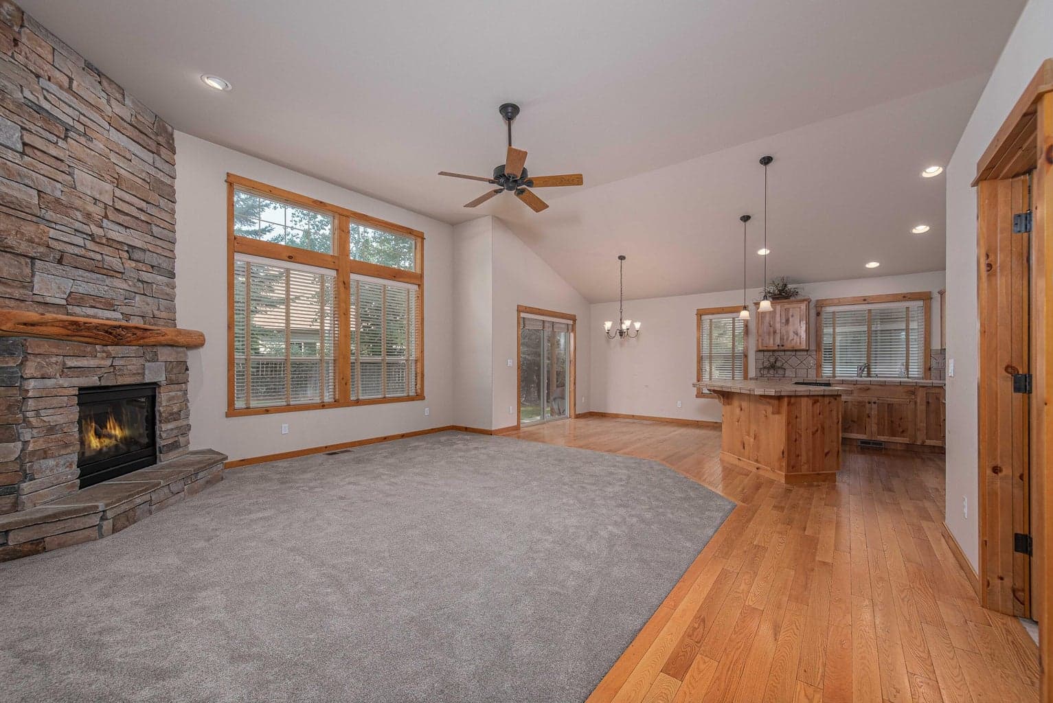 BRAND NEW carpeting with wood floors in the great room