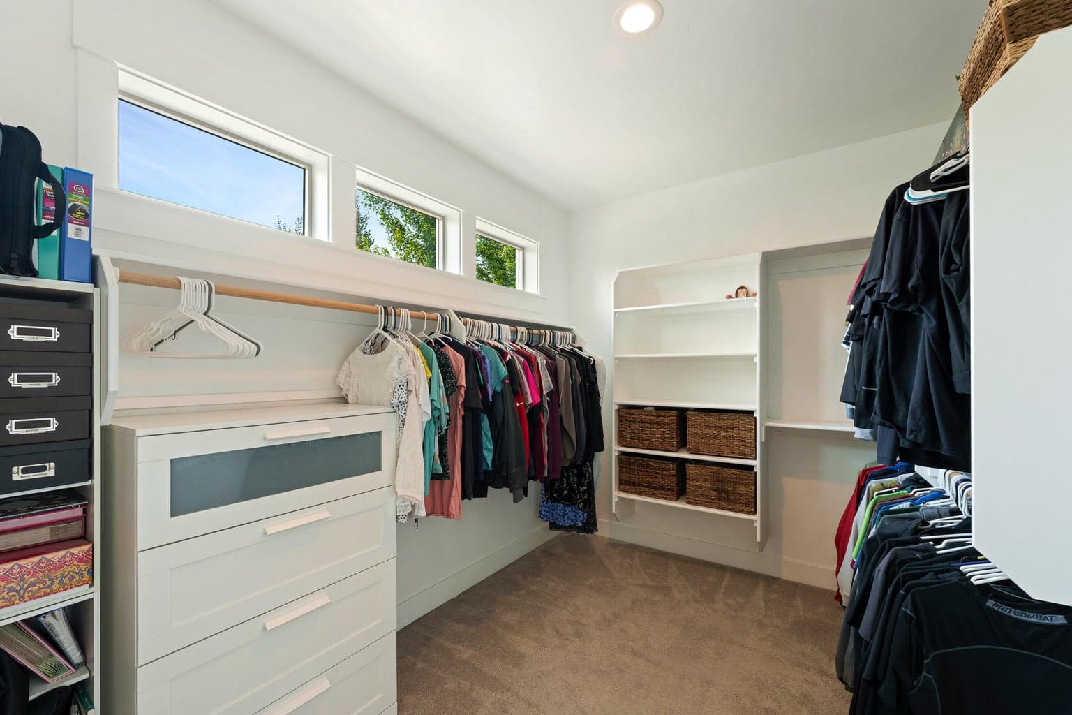 Primary bedroom walk-in closet