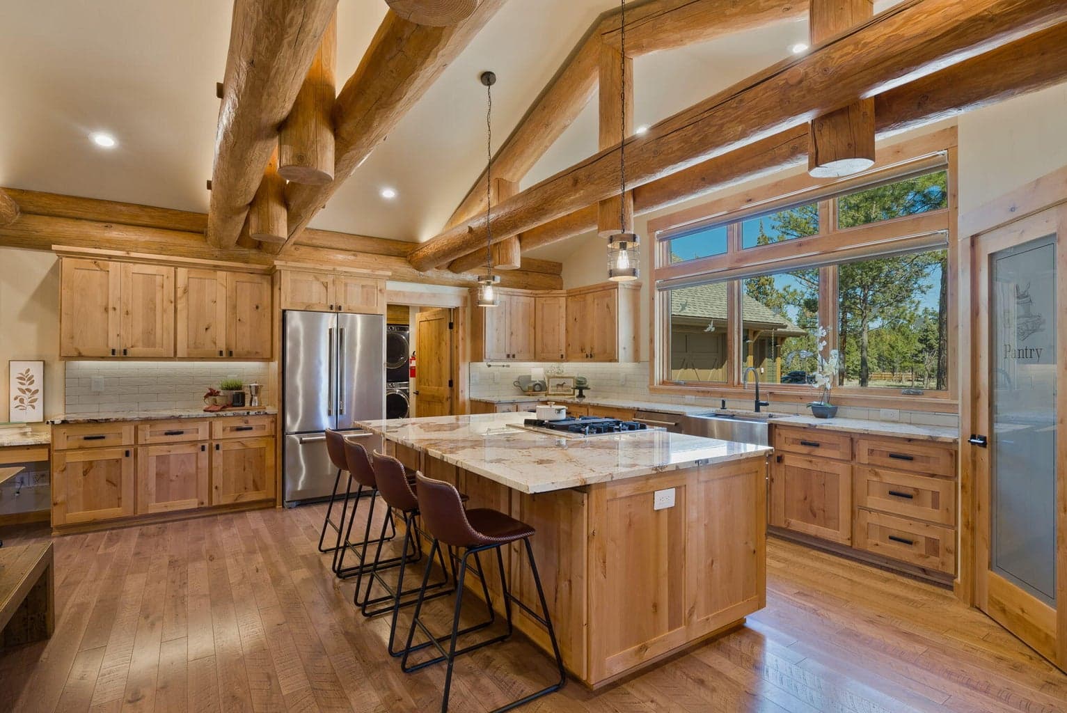 Custom kitchen with granite countertops, high-end appliances, butler pantry, & more!