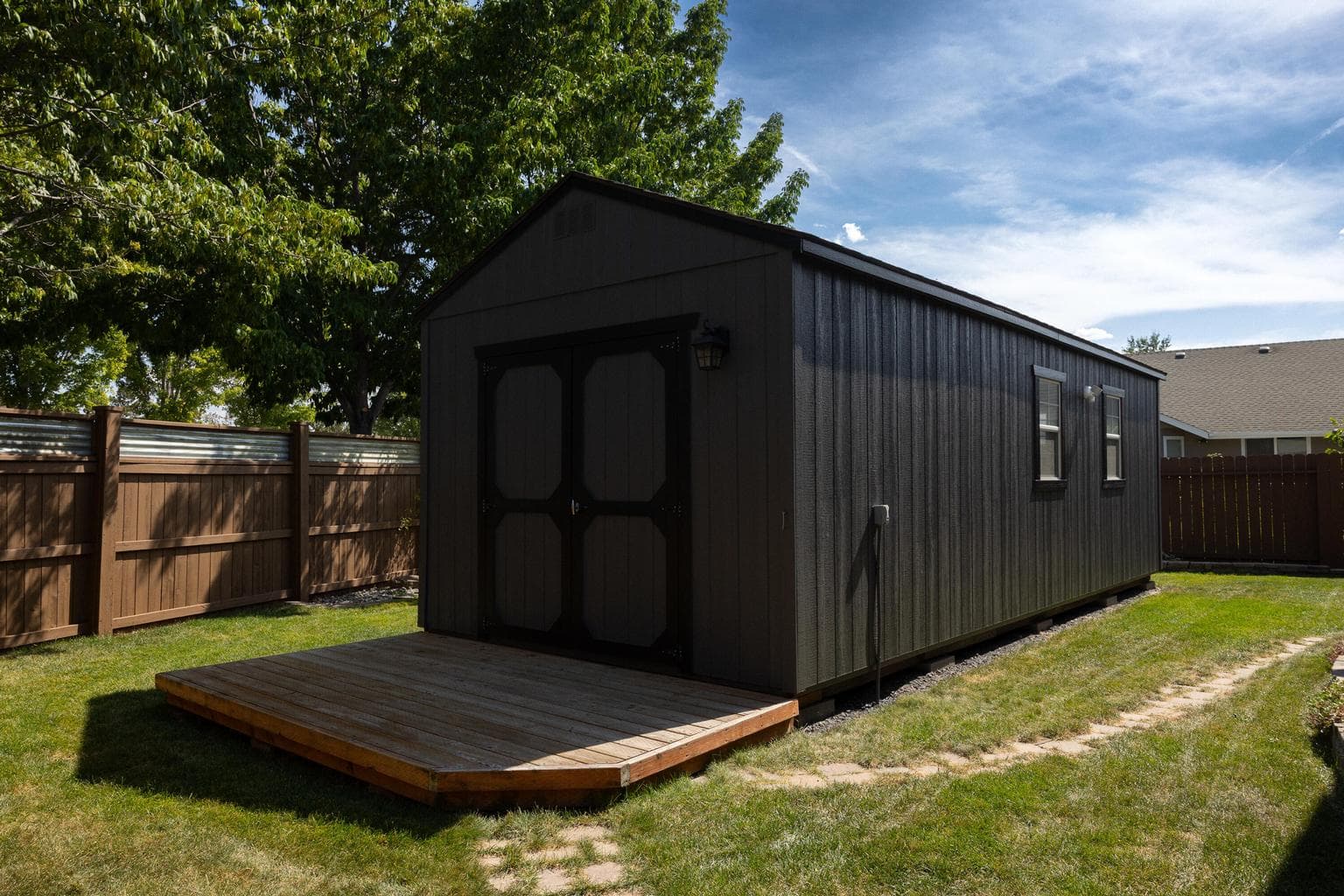 10' x 30' shed, currently outfitted as workout space/home office/kids play area