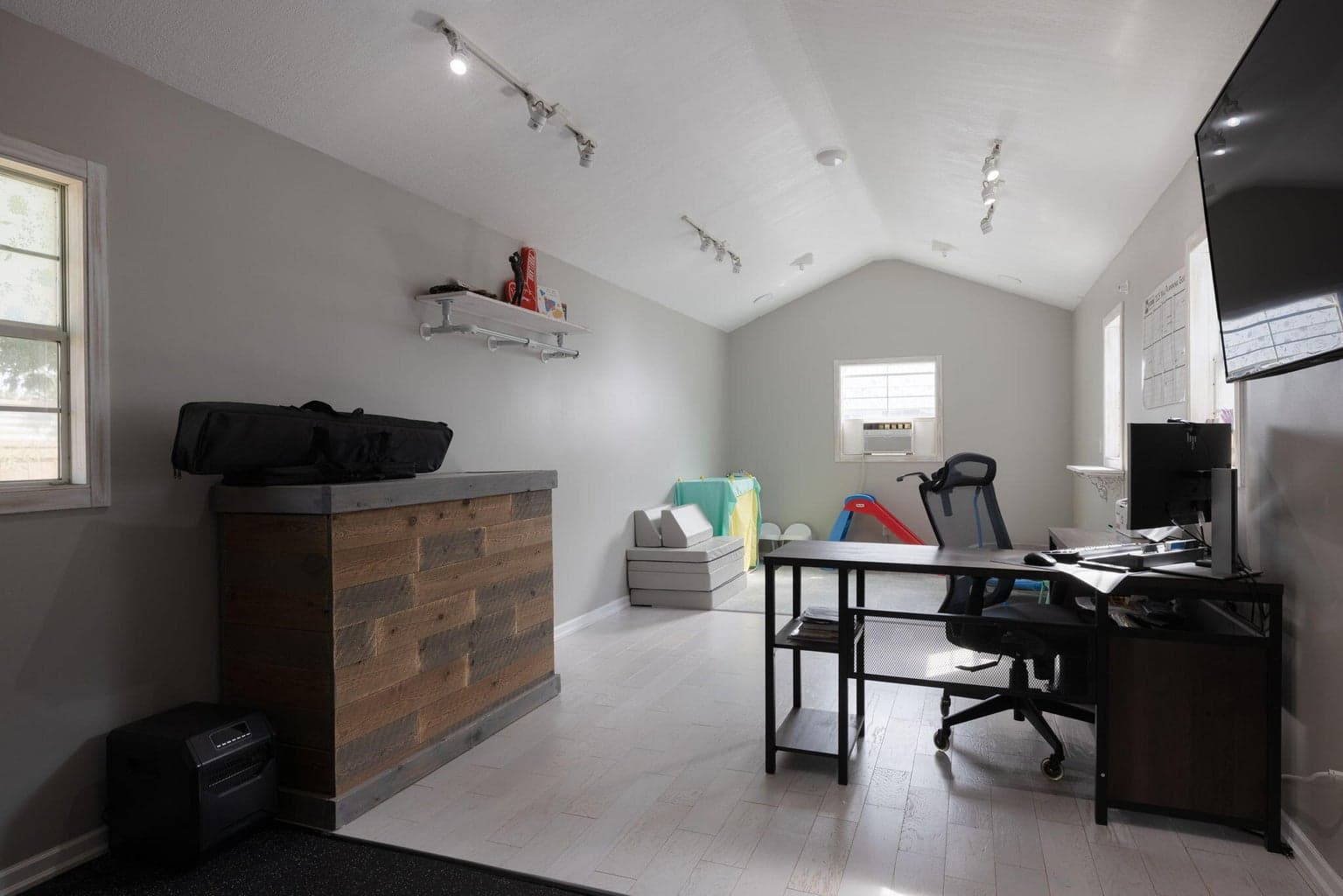 10' x 30' shed, currently outfitted as workout space/home office/kids play area
