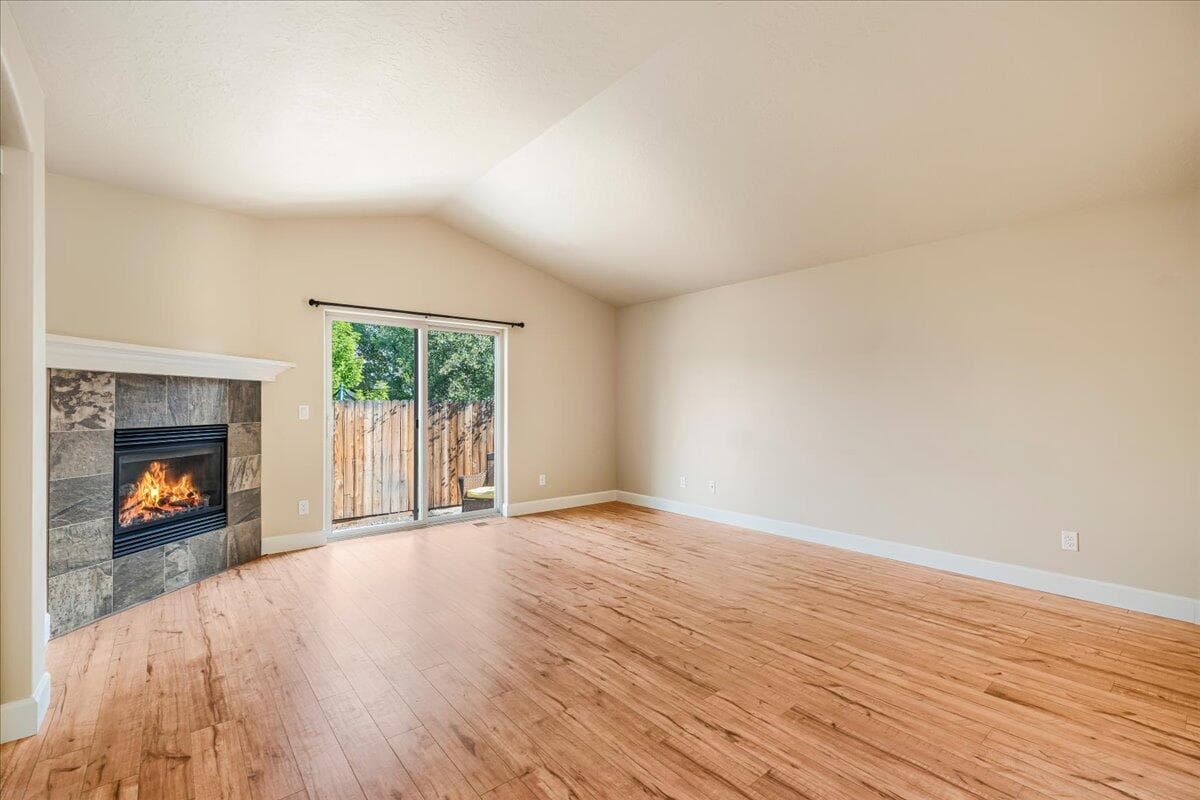 Great Room with Vaulted Ceilings and Cozy FIreplace