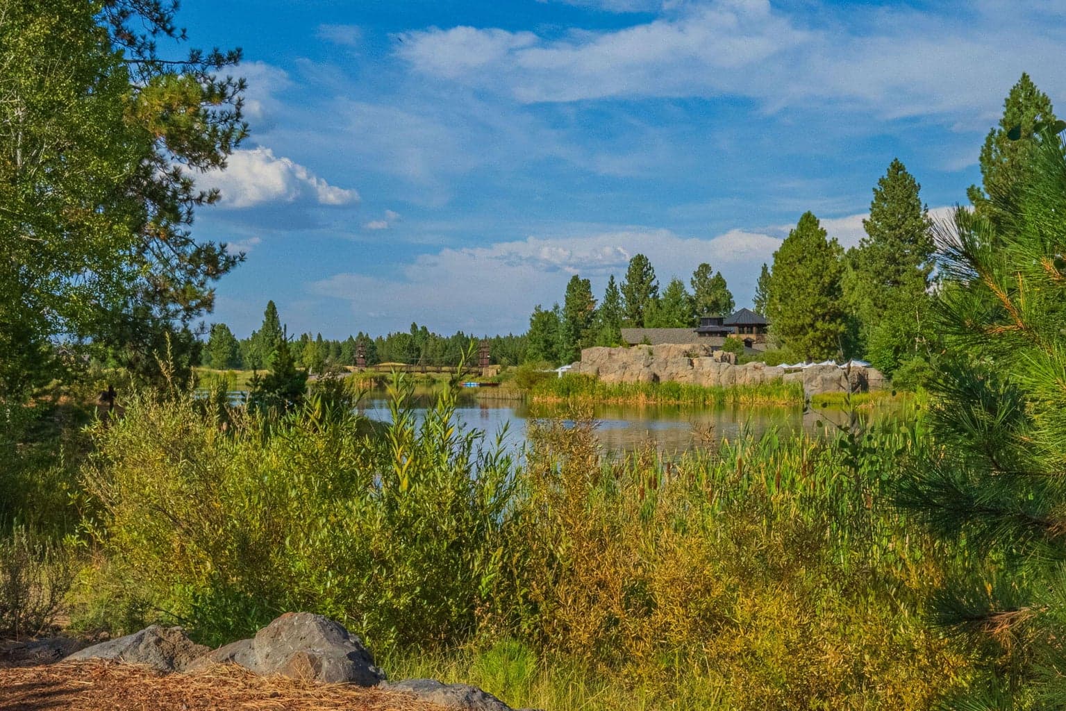 Views across the Lake to the Lake House, Quarry Pool and Fitness Area