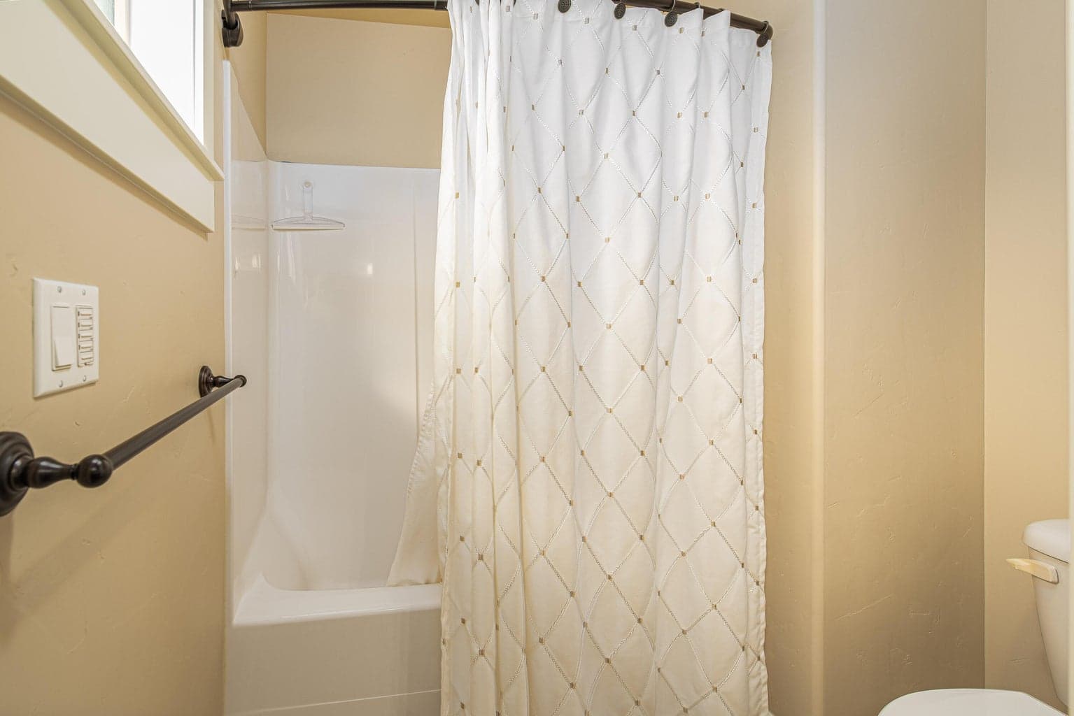 Upstairs bathroom private toilet and shower area