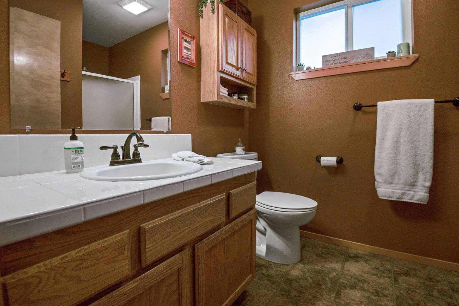 Main level bathroom is adjacent to a main level bedroom