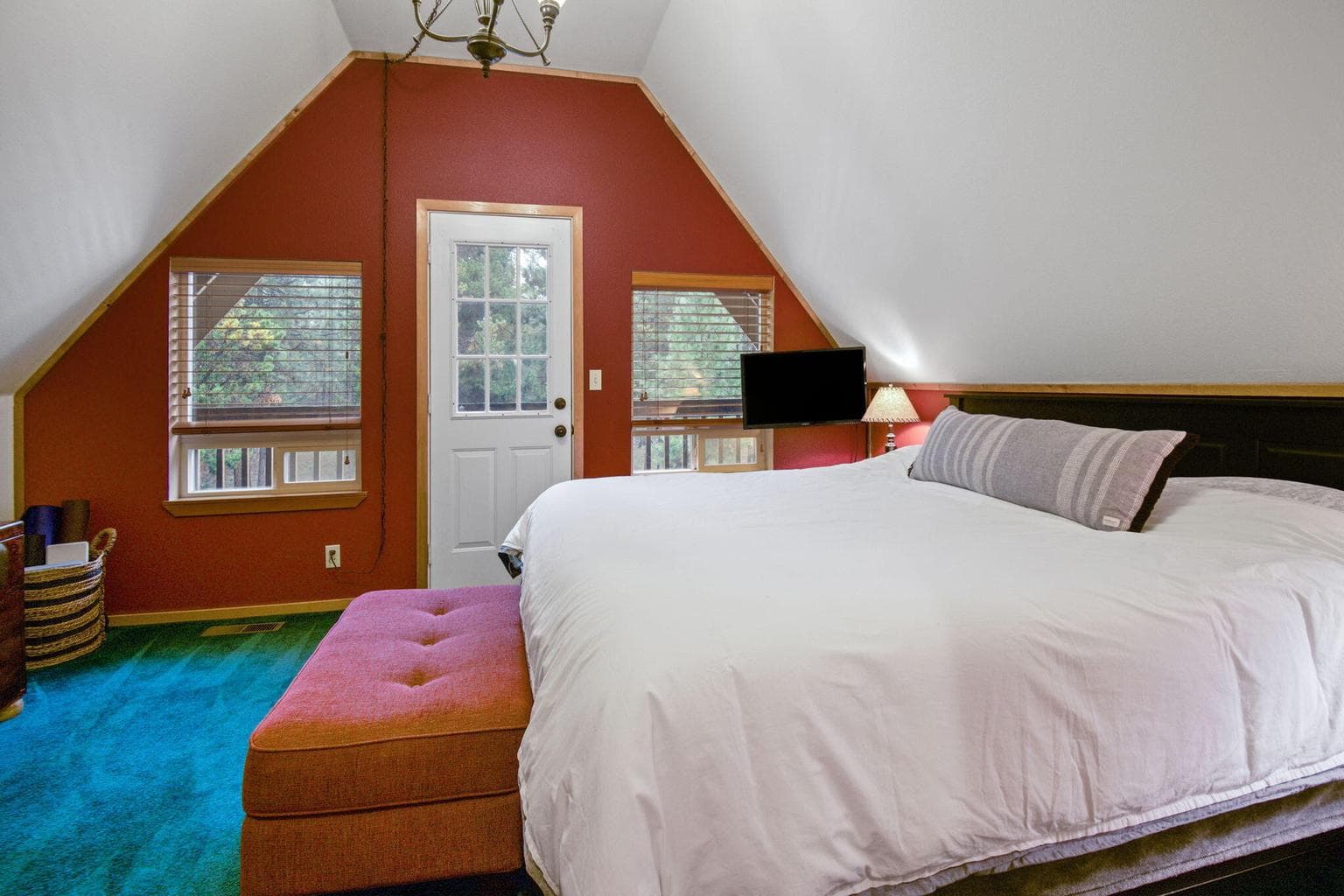 Large bedroom with a door to the upper deck