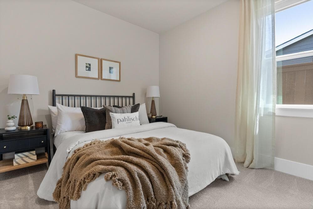 Image of like kind home primary bedroom. Options and colors may vary.