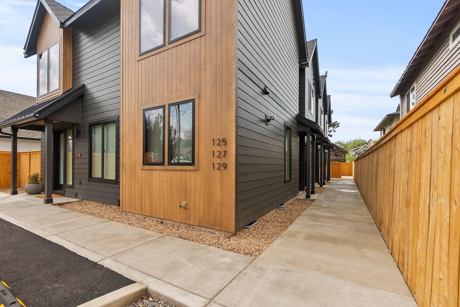 Private on site parking for each unit, trash enclosure and storage sheds.