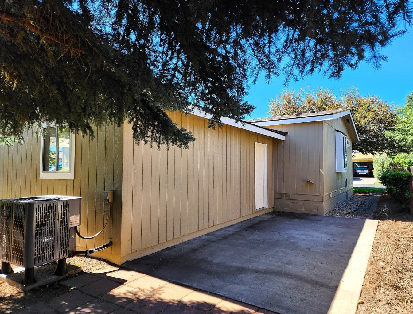 Back of property has concrete patio