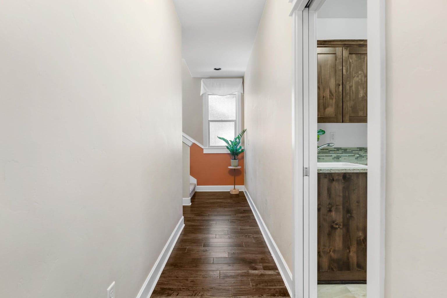 Hallway behind kitchen