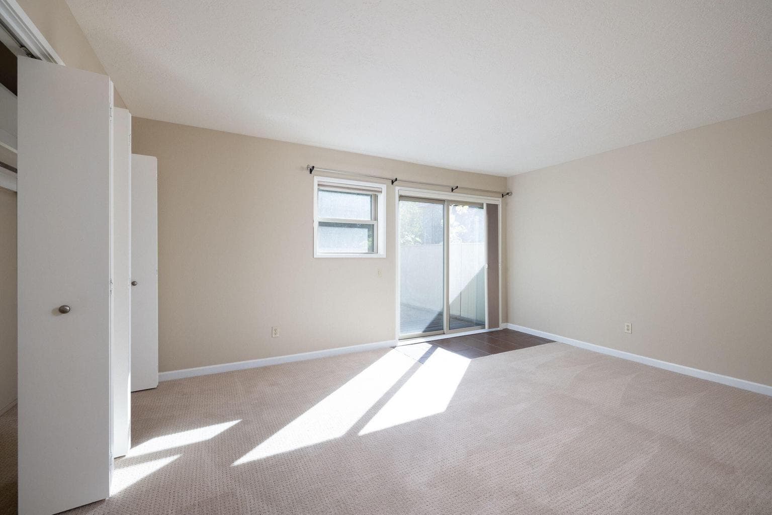 1st floor bedroom with slider to private deck.