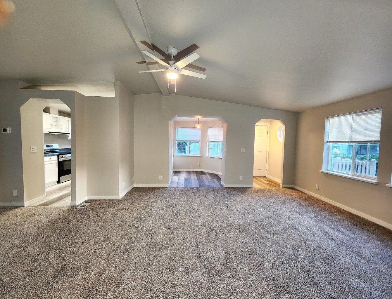 Great Room looking toward kitchen, breakfast nook, and foyer