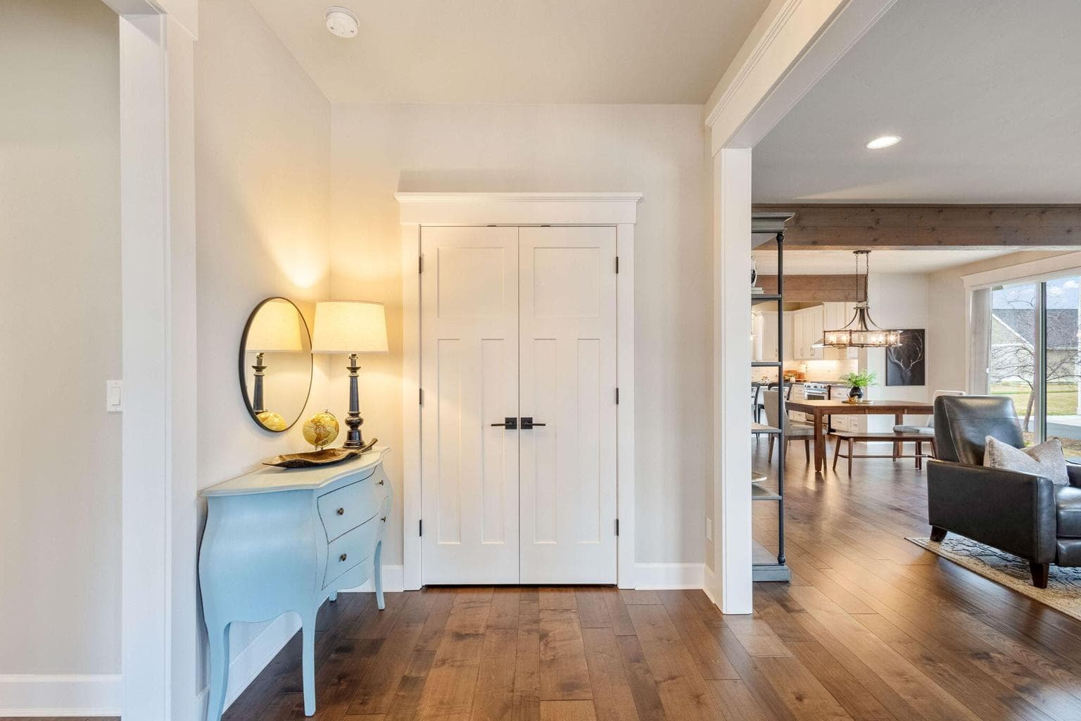 Warm 'wood 'flooring and light color palette are very inviting.