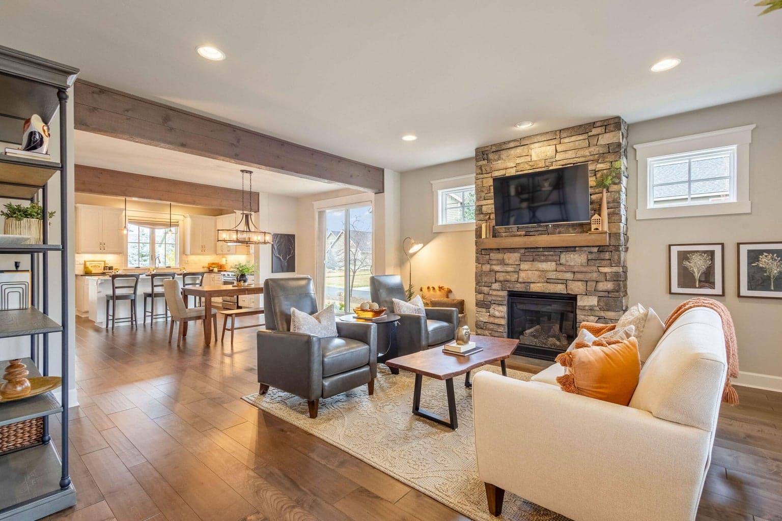 Gas fireplace with stone surround bring a cozy element into the home.