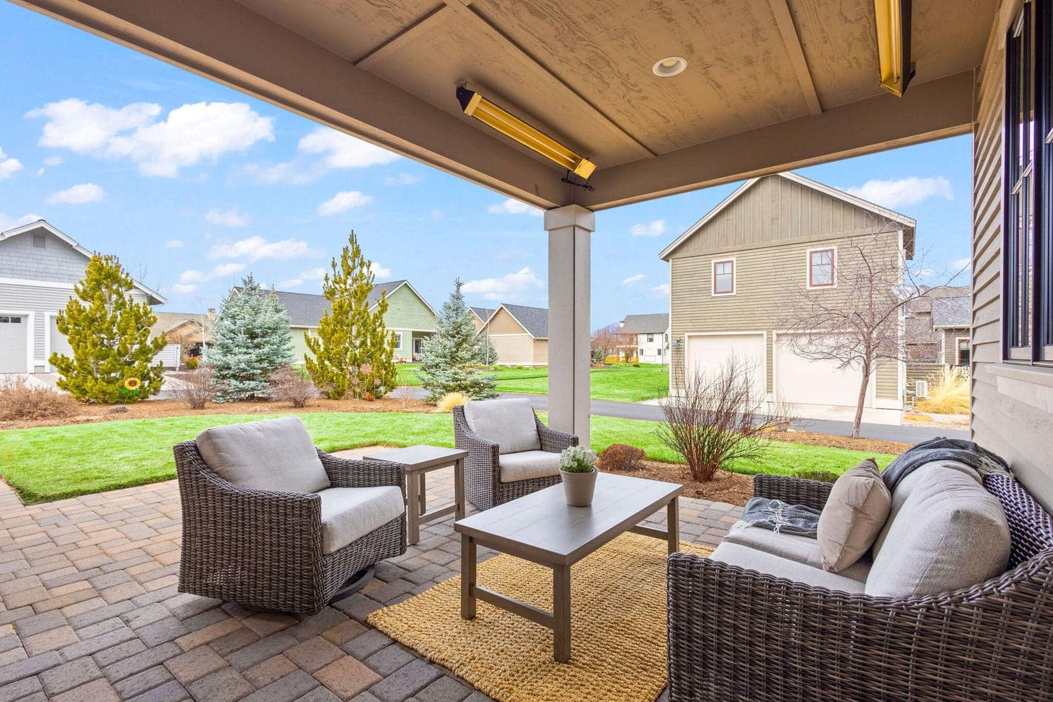 Lovely outdoor space with covered patio and heaters for 4 season outside enjoyment.