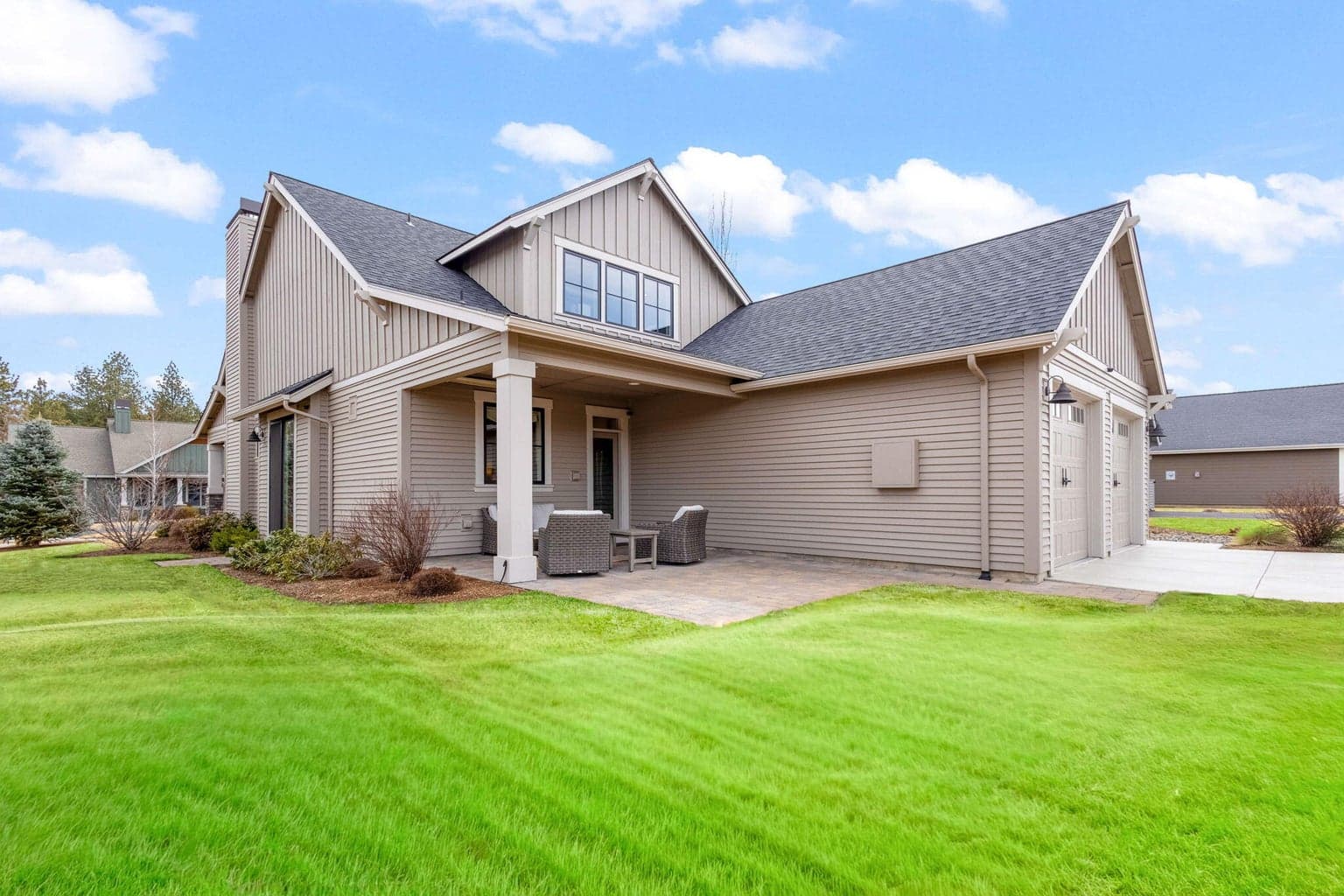Lush landscaping & extended driveway for extra parking