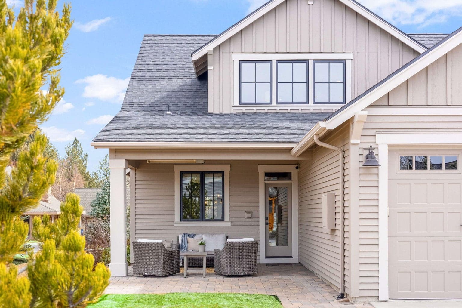 Covered rear paver patio with built-in heaters