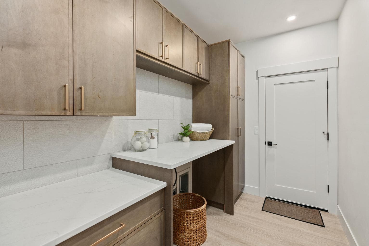new cabintry, counter tops in spacious utility
