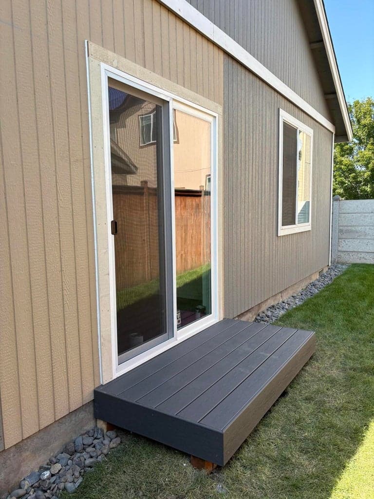 New sliding door and Trex landing from side yard