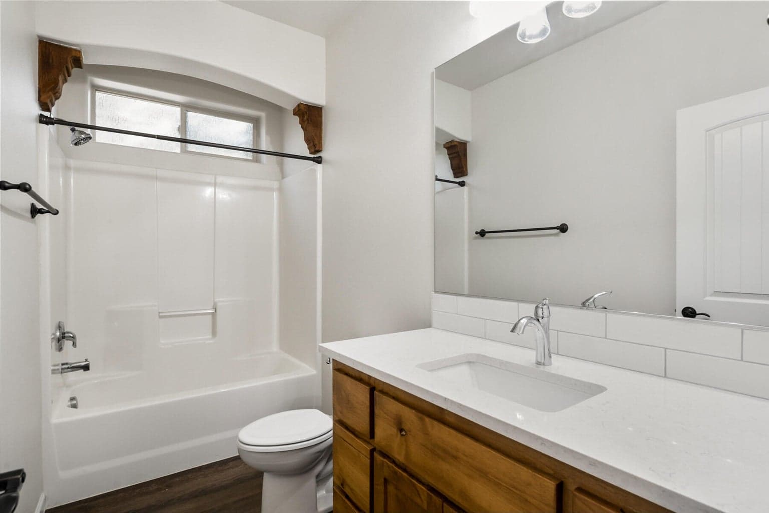 Wood cabinetry and quartz counters