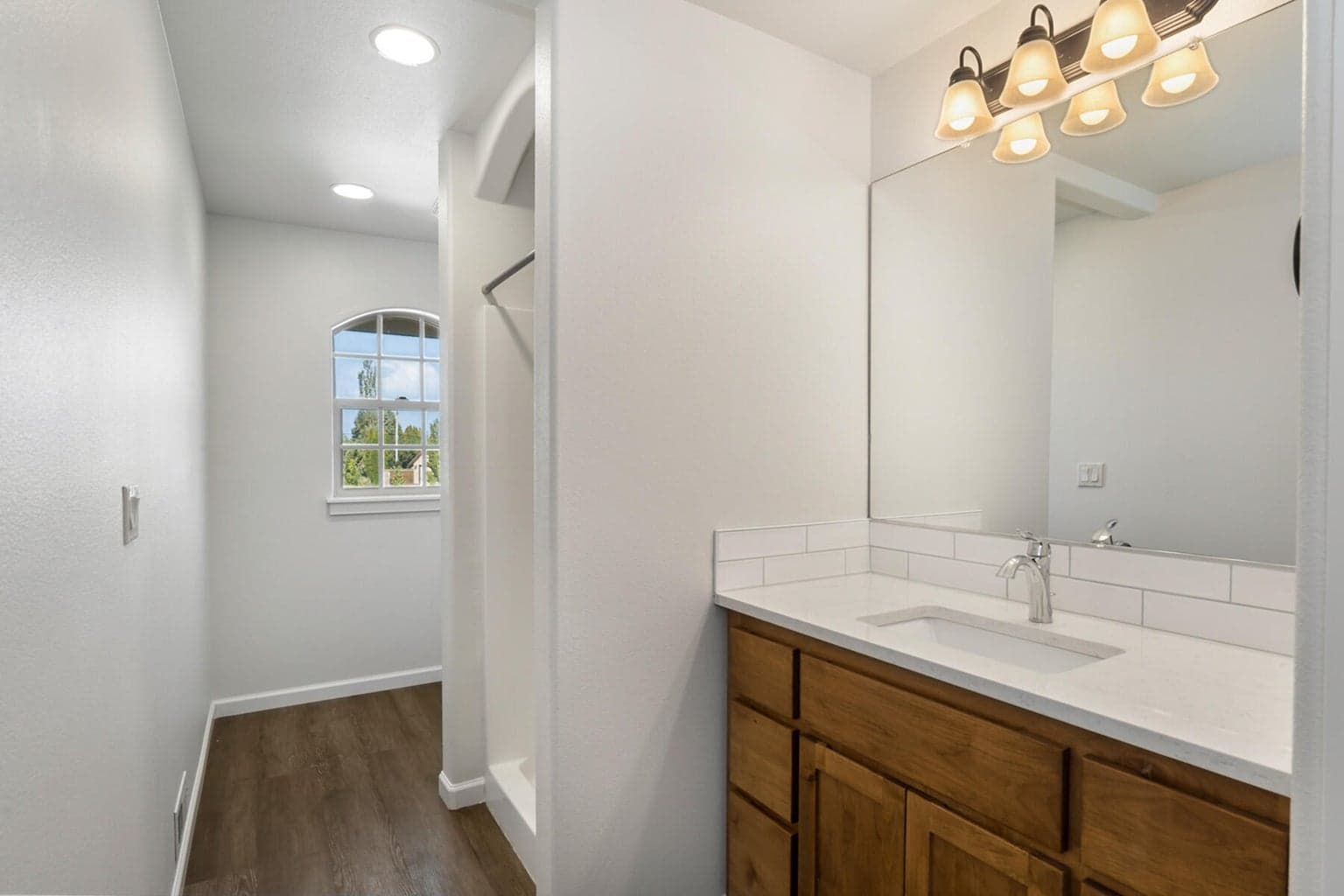 Wood cabinetry and quartz counters