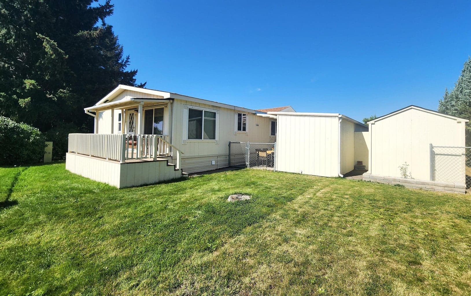 Fenced back yard and back deck