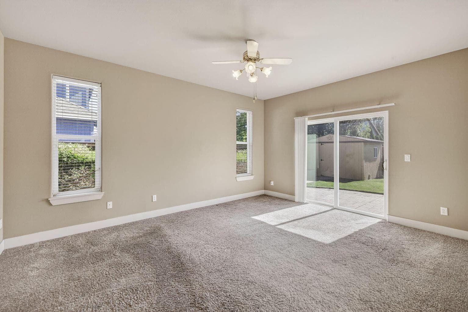Primary Bedroom with slider to backyard