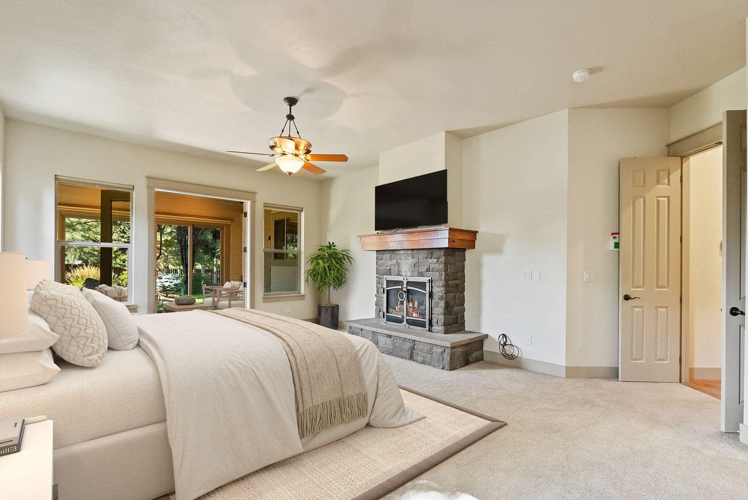 Primary suite with Extraordinaire fireplace (virtually staged)