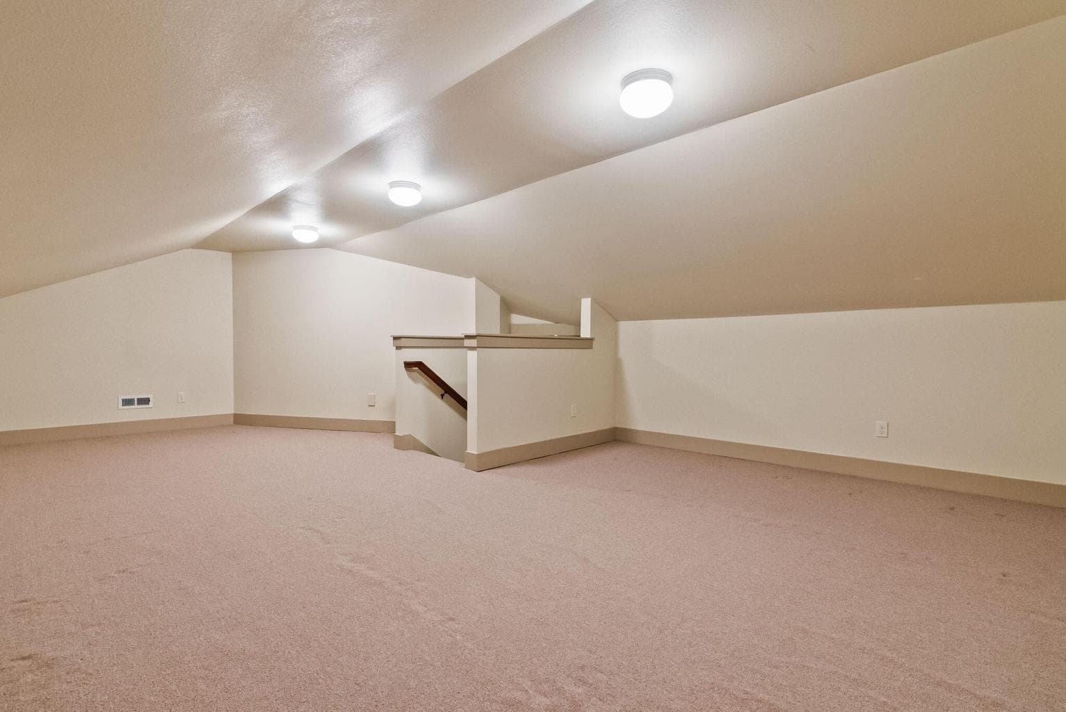 Finished storage room above garage