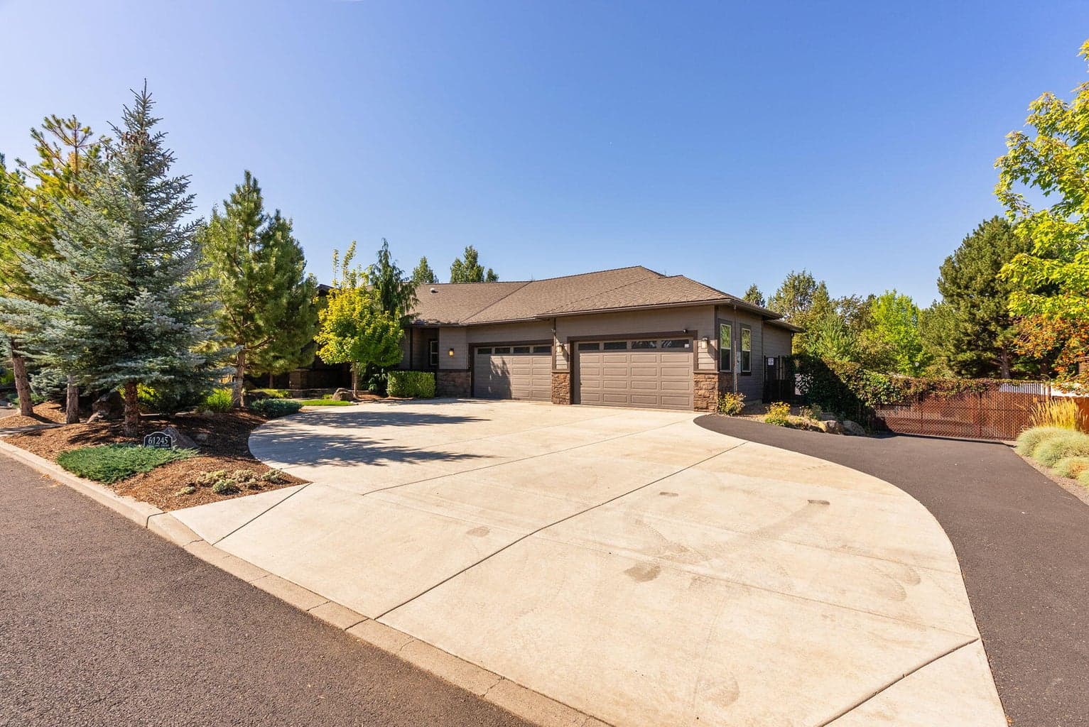 4 car garage with gated RV parking