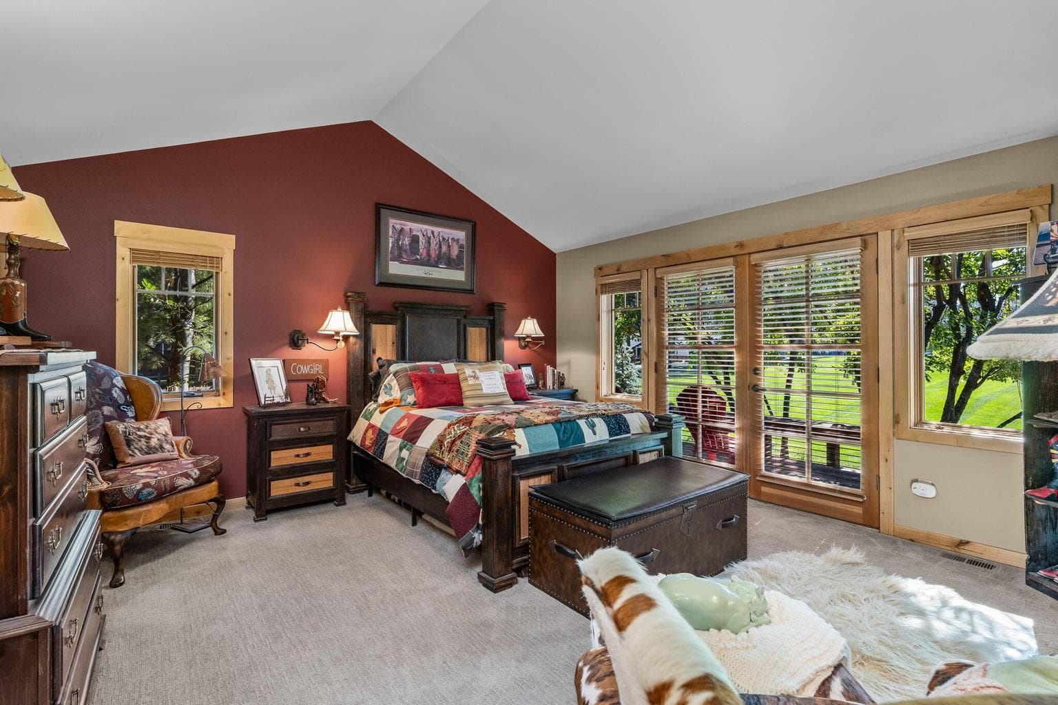 Primary bedroom with doors to deck