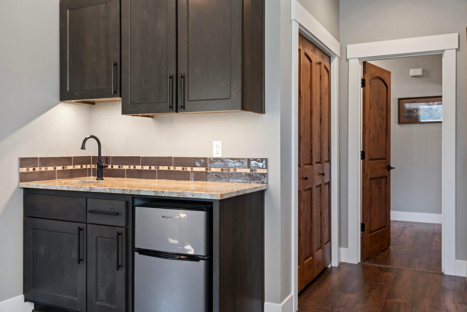 4th Bedroom- wet bar, closet, hallway leading to Bedroom 2 & 3.