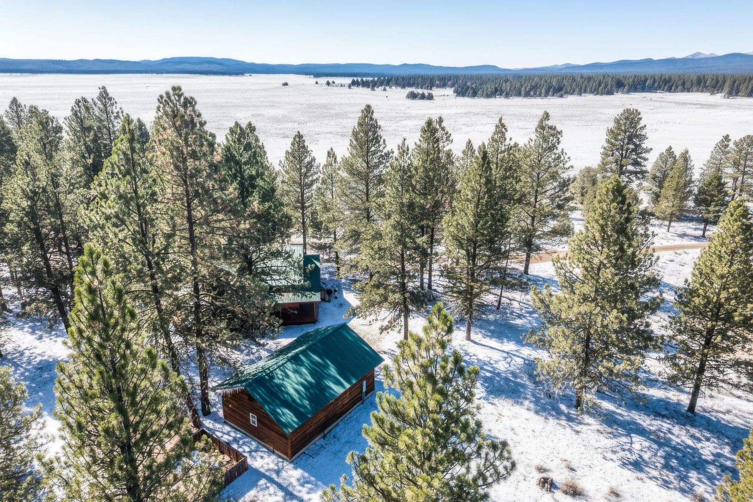 Top-down shot showing the property with a light dusting of snow.