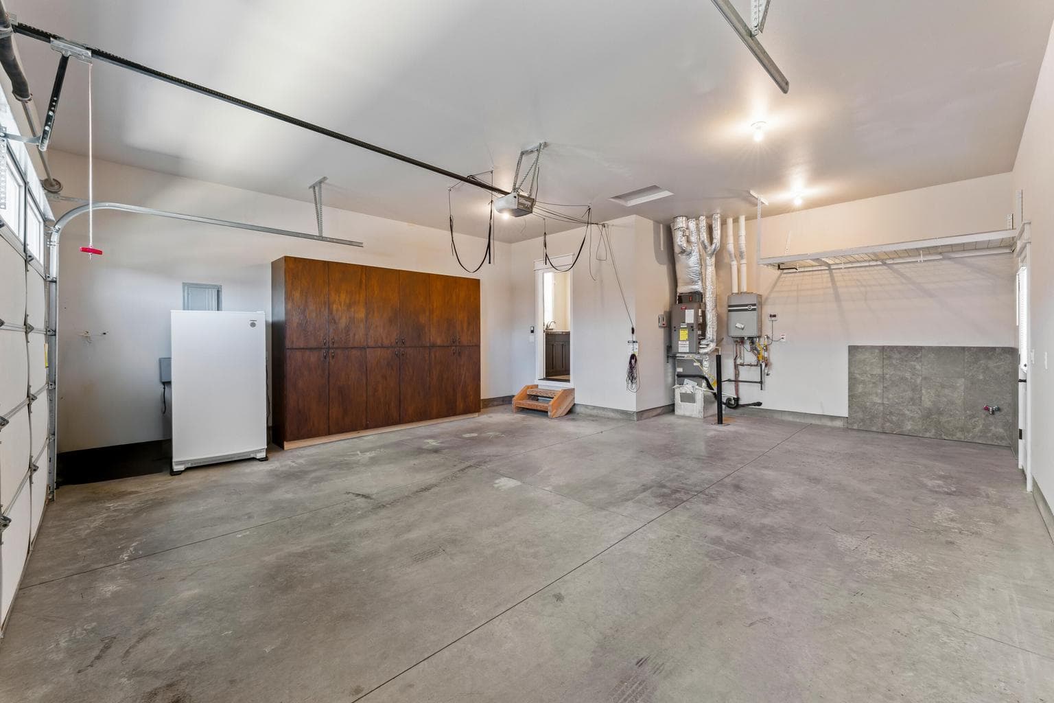 Includes a dog wash station and room for an extra freezer