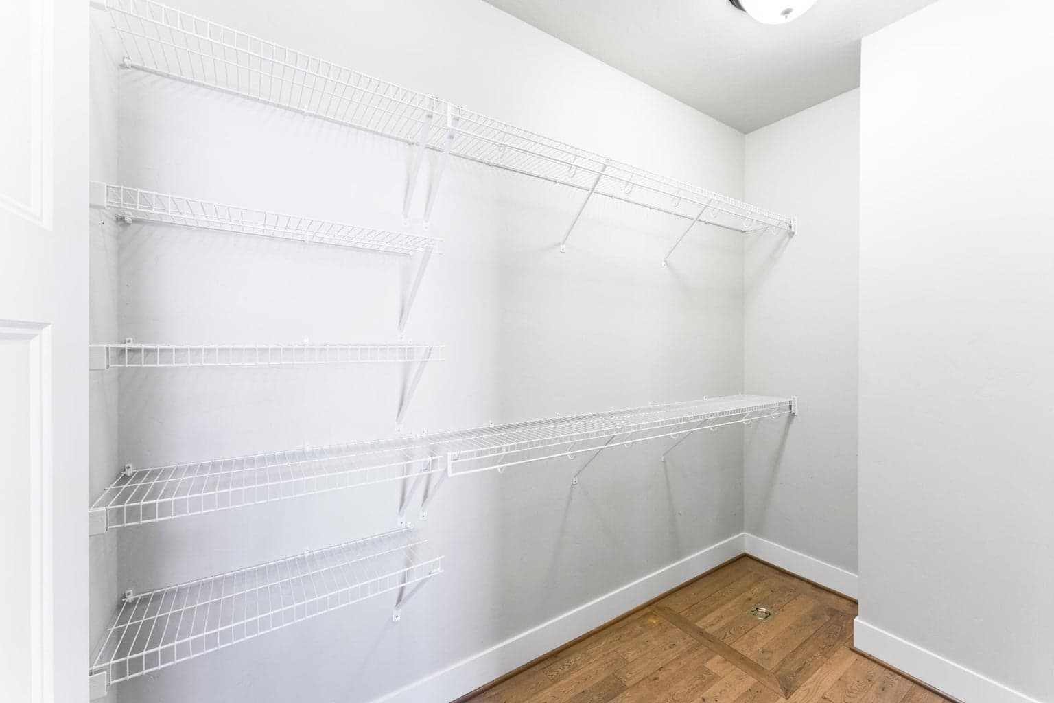Includes organizer shelves and hangers