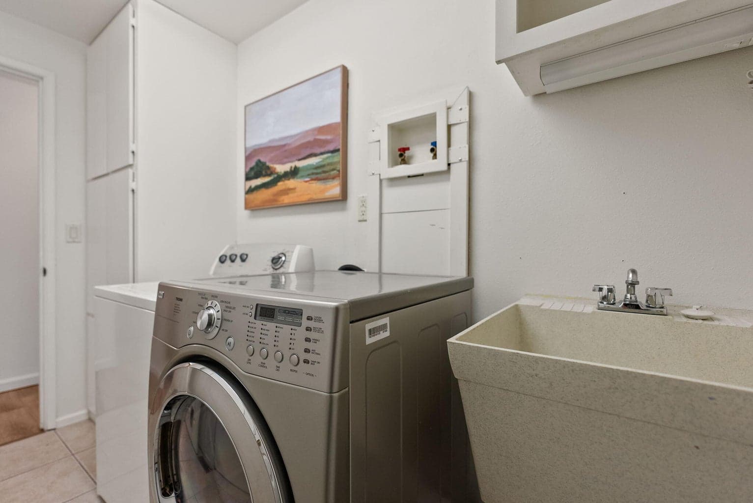 Laundry with utility sink and storage 2858 NE Canyon Park Drive Midtown Bend