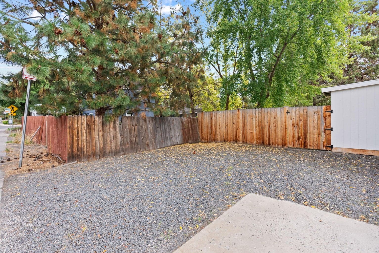 Bonus Parking Pad and gate to back yard.