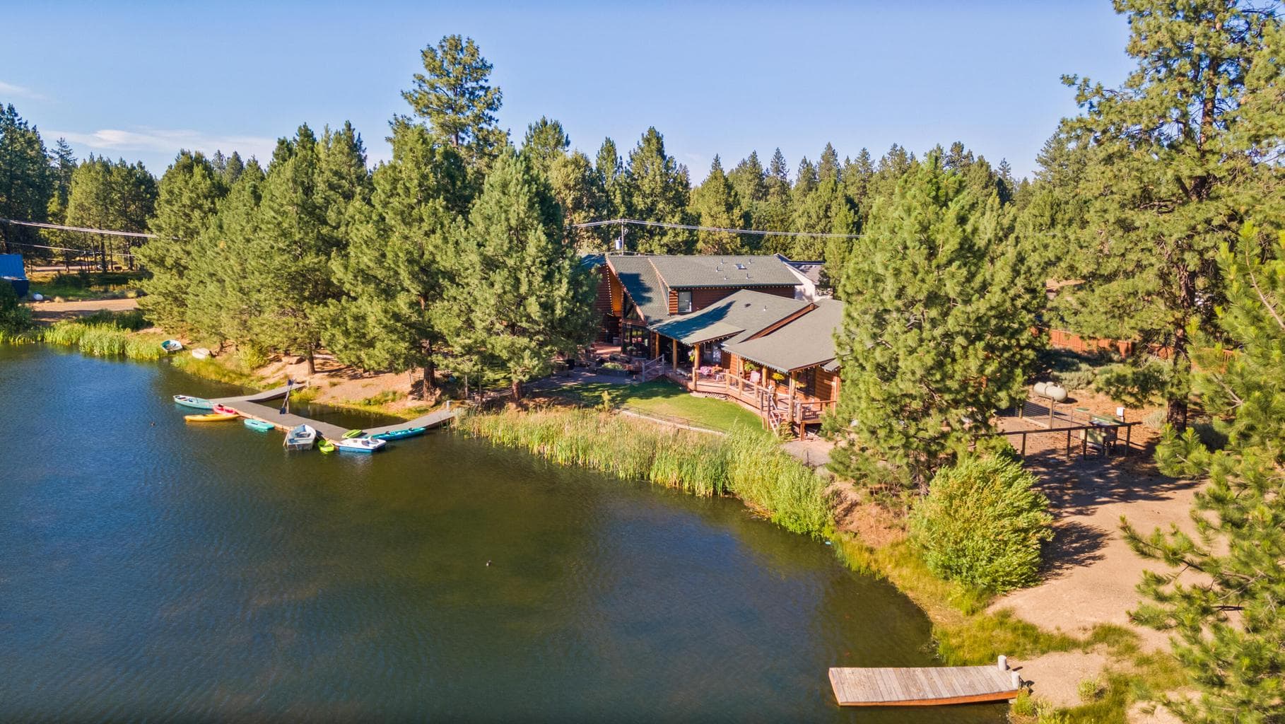 The stocked 5 acre pond is a secluded oasis perfect for hosting private fly fishing excursions or enjoying time out on the kayaks and paddleboards under the Central Oregon skies.