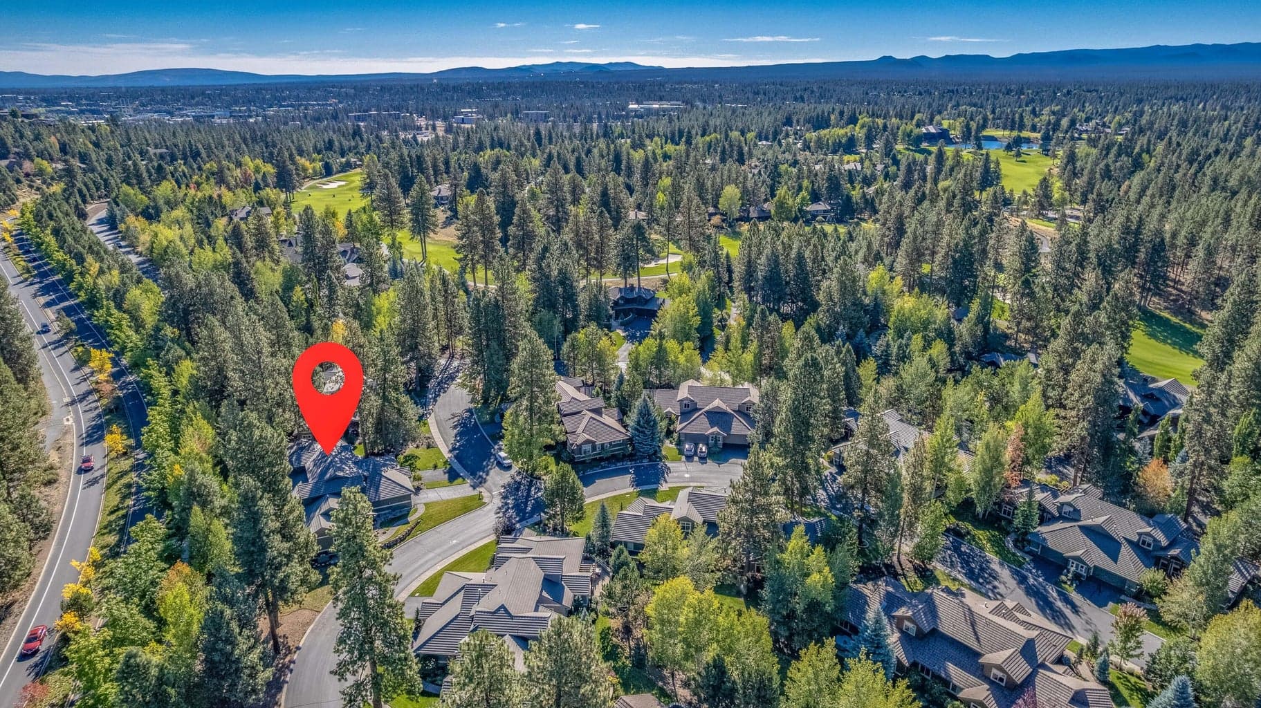 The Broken Top neighborhood on Bend's westside is planned around a golf course, lake, and club house. Membership is optional, more information is attached to the listing