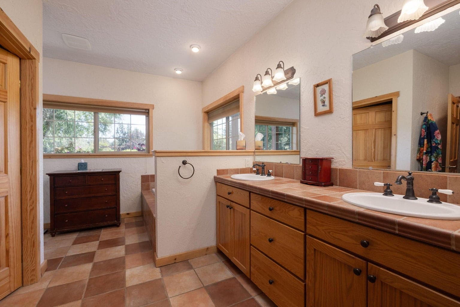 primary suite bath, double vanity, tile flooring & counters