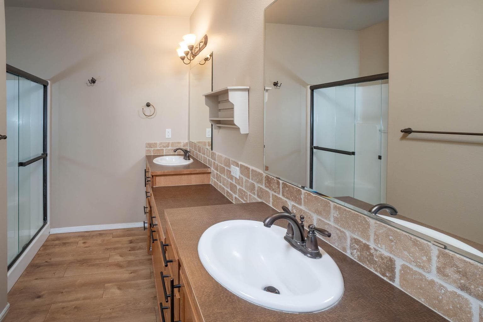 Dual sinks, walk-in shower, soaking tub, walk-in closet