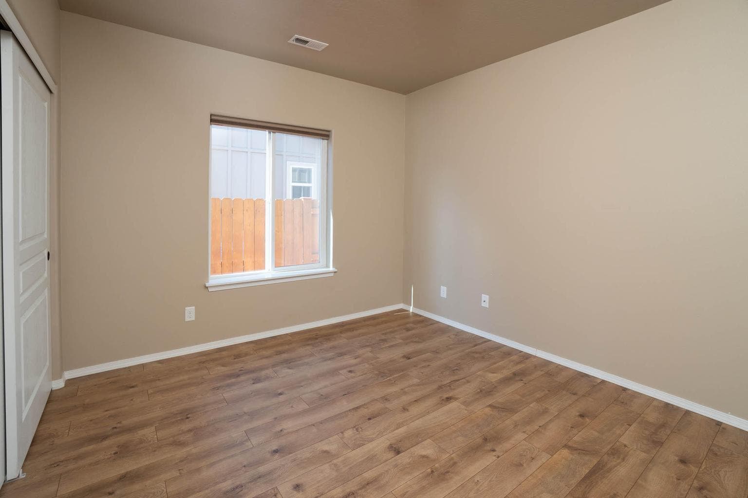 Bedroom #3 with nice window and closet